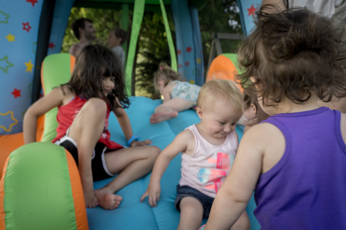 Kids playing on bouncy house